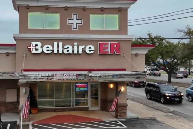 Bellaire ER entrance at 5302 Bellaire Boulevard, with the Bellaire ER sign and Open 24 Hours sign
