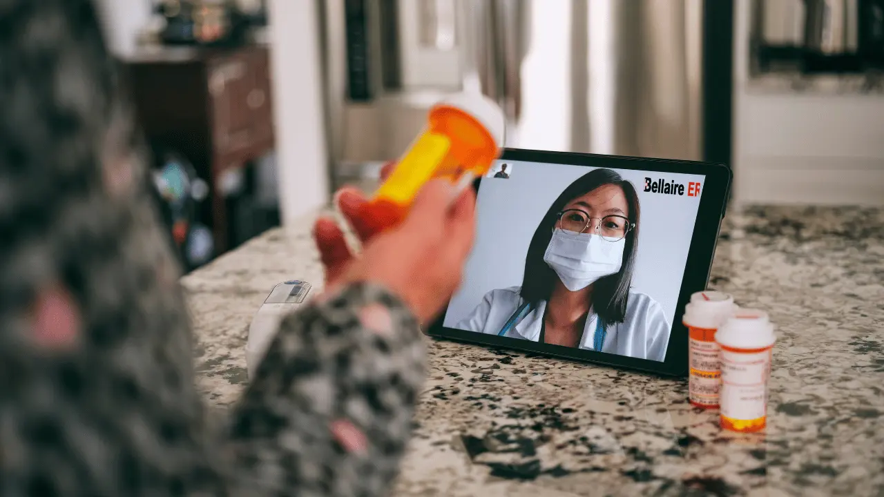 Patient consulting with a Bellaire ER physician via telemedicine video call